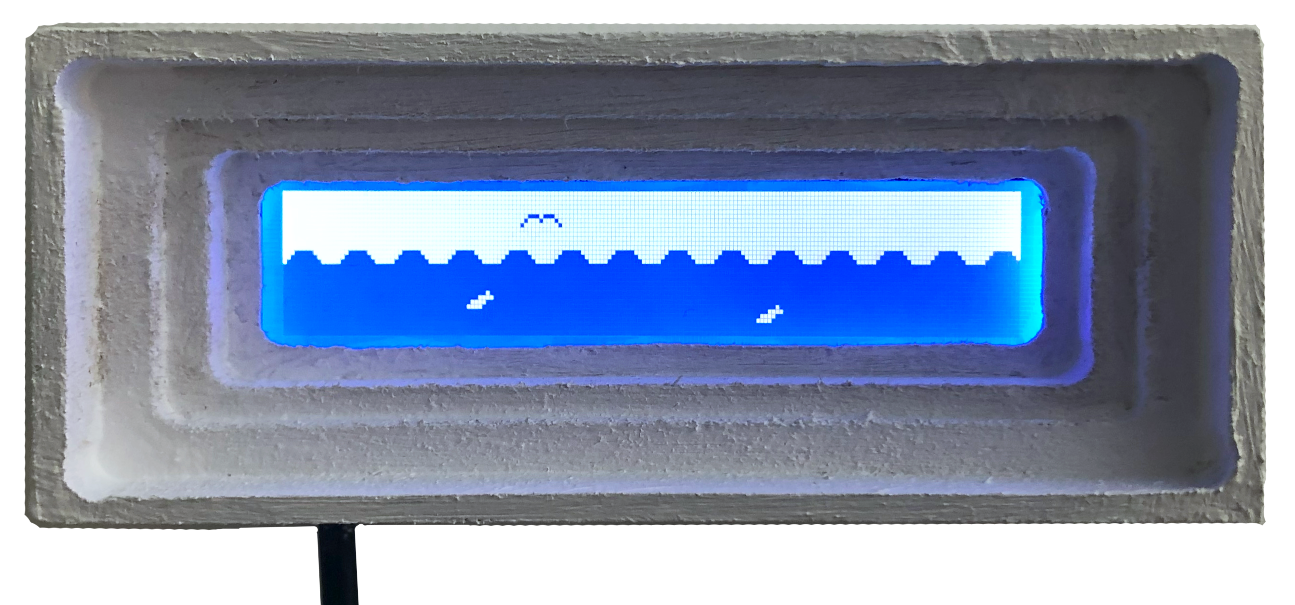 blue lcd screen with animation of birds and fish above and below the ocean all in a white frame