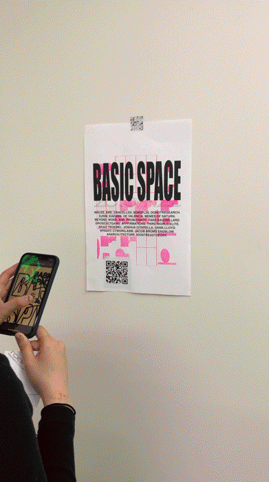 A person scanning a QR code on a poster, whose title text reads 'BASIC SPACE', with their phone.