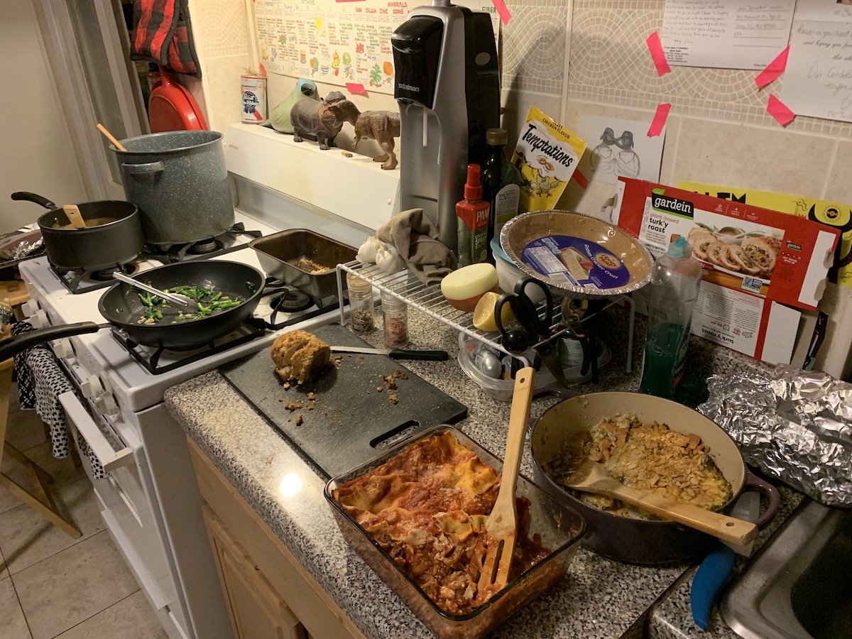 photo of my kitchen counter and stove with dinner spread out