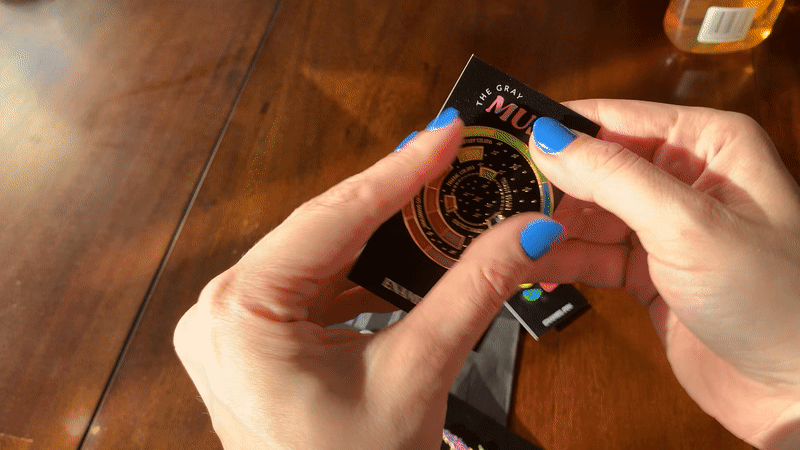 animated gif showing me spinning the top wheel on the black and gold color wheel pin